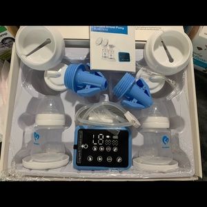 Bella baby nursing pump.double electric.Handheld Hakka pump. Sterilized-low use